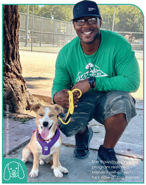 dog smiling with thriving inmate in prisoner dog program