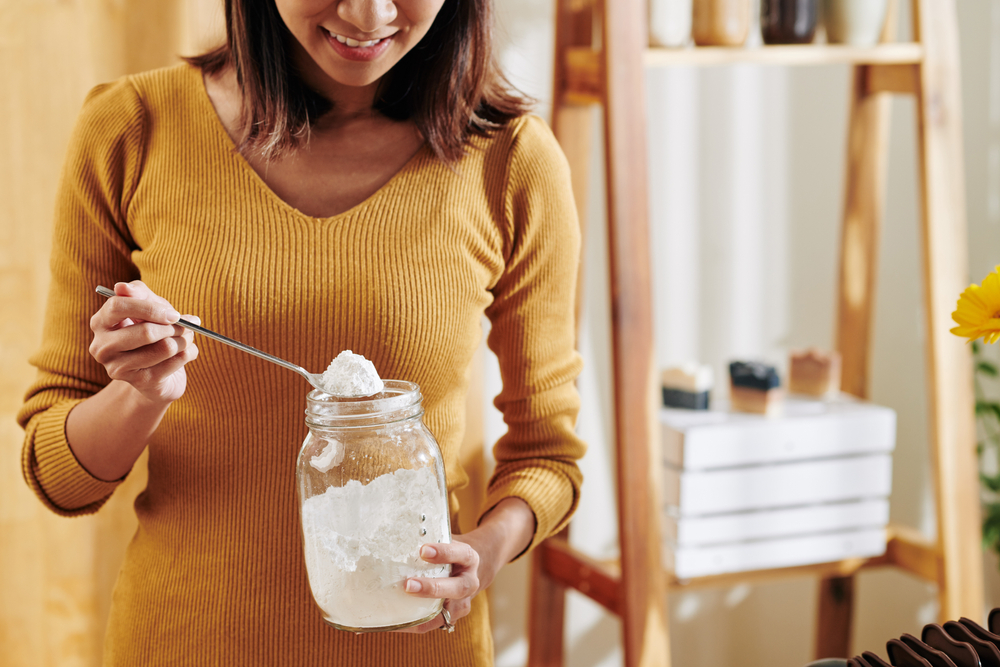 women holding baking soda